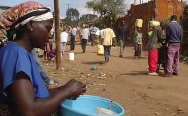 About Water: People and Yellow Cans